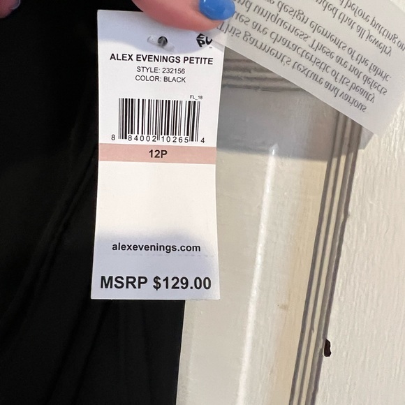 NWT black formal dress w/ some sheer swing side overlay on chest. Zip closure - Picture 3 of 7